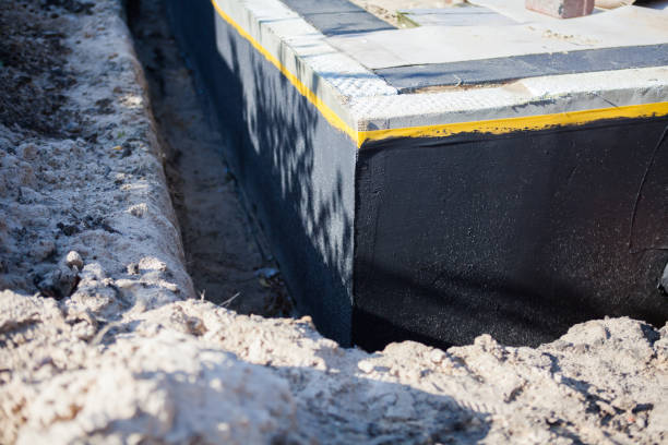 Professional Waterproofing technician working in Elgin, IL